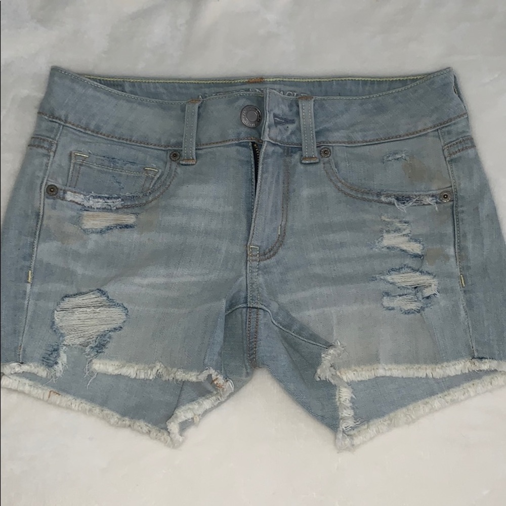 light wash distressed jean shorts